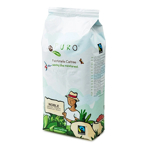 En pose med puro fairtrade-kaffe merket "redde regnskogen", med illustrasjoner av en person som driver hagearbeid og regnskogelementer.