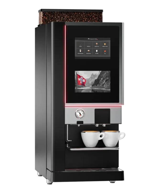 Aequator Exqwiss espressomaskin har en elegant digital skjerm som viser drikkealternativer, to kopper perfekt plassert under doble dispensere og en synlig bønnebeholder på toppen for nytelse av fersk kaffe.