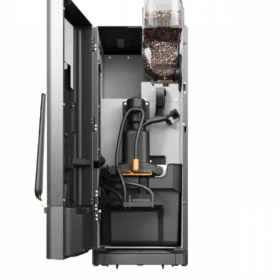 Innvendig visning av en kaffemaskin som viser bønnebeholderen fylt med kaffebønner, interne slanger, en pumpe og diverse mekaniske komponenter.