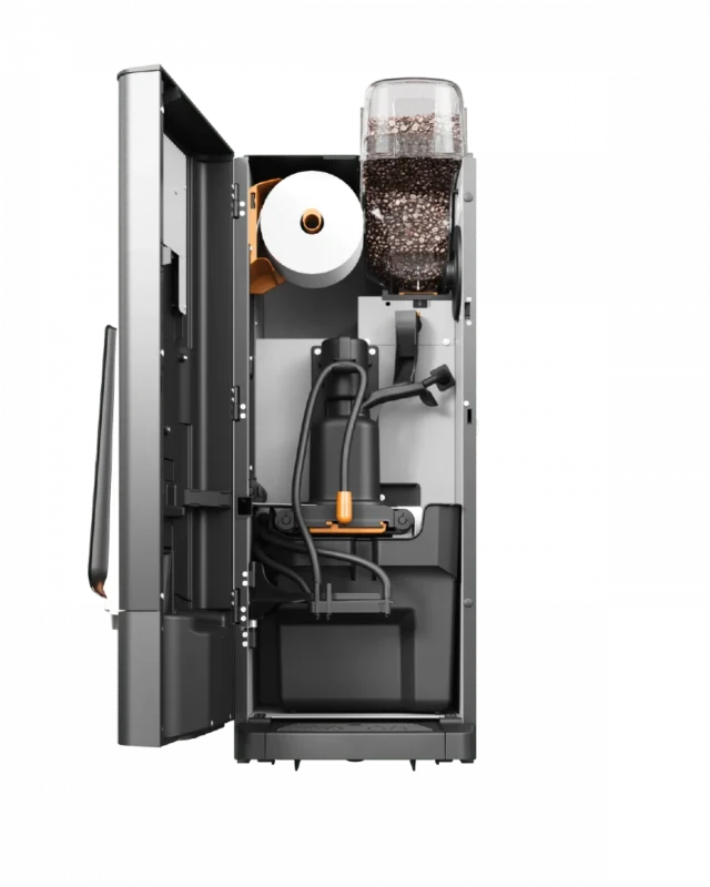 Åpen visning av en kaffemaskin som viser interne komponenter, inkludert en vannbeholder, kaffebønnebeholder, slanger og ledninger.