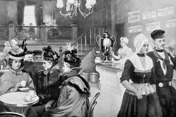 Kafescene fra viktoriansk tid med kvinner i hatter som sitter ved bordene, en server i tradisjonell kjole og en disk med en stor samovar og menyskilt – et tidlig nikk til hvordan dagens kaffemaskin øker produktiviteten.