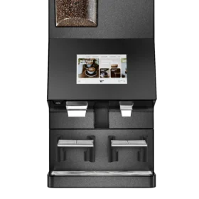 Svart kaffeautomat med berøringsskjerm, innebygd bønnebeholder på toppen og to utløpsdyser over doble koppskuffer.