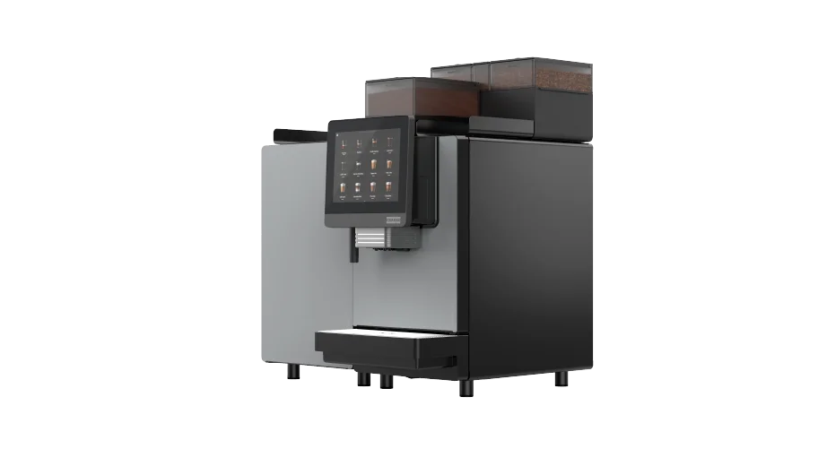 Moderne, svart og sølvfarget kaffemaskin for profesjonell bruk med berøringsskjerm og rom for kaffebønner og malt kaffe, avbildet mot en ensfarget bakgrunn.